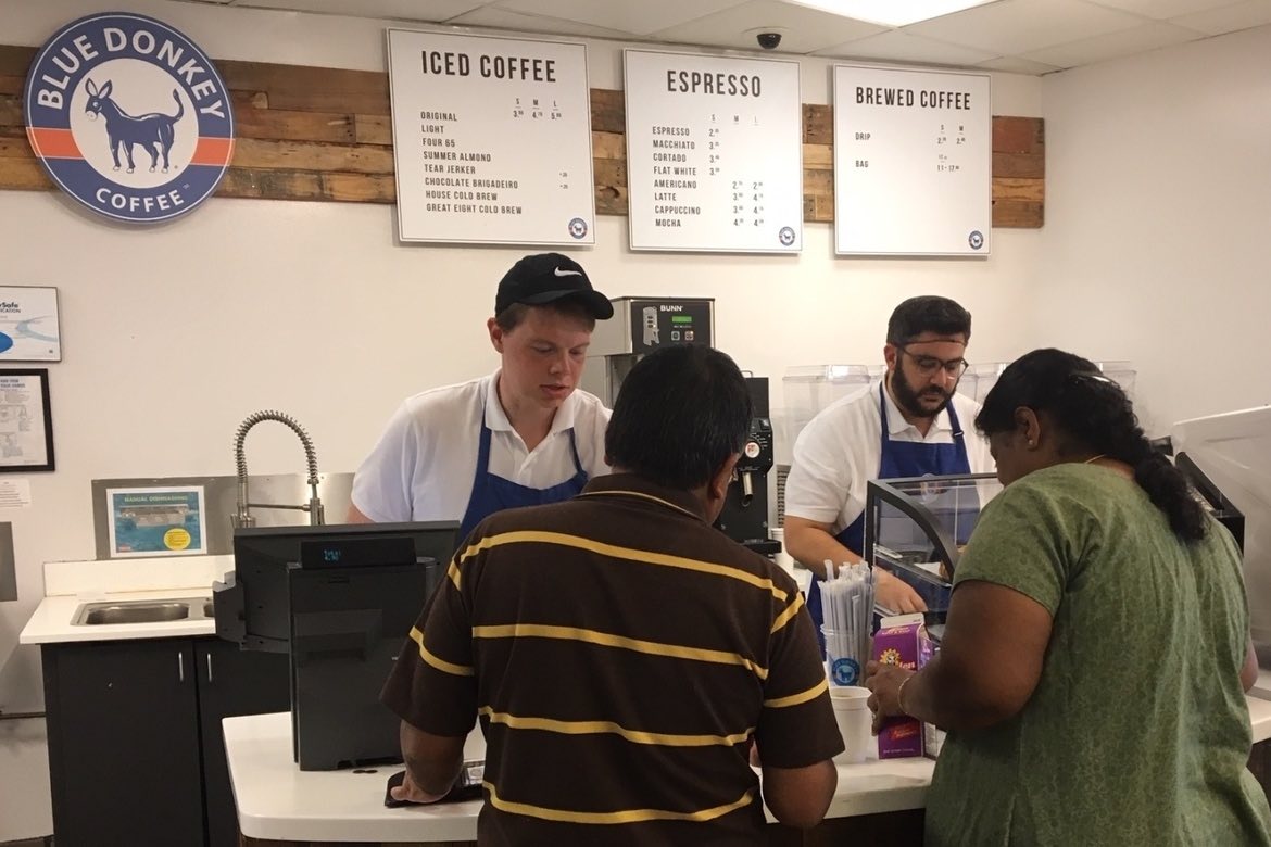 Customers being served at Blue Donkey Coffee